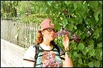 Astrid smells the flowers